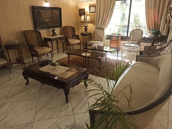 Living area - Welcoming 3-bedroom apartment with AC in vibrant Cairo Governorate (Cairo Governorate)