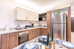 Fridge, microwave, oven, stovetop - Rooftop Pool Oasis | Walk to Beach & 5th Avenue (Playa del Carmen)