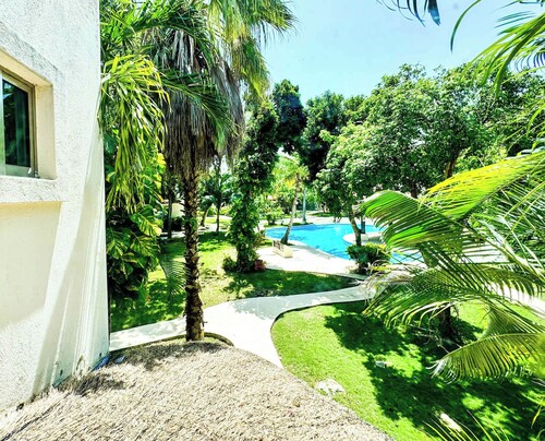 Tropical 3BR retreat w/ pool & beach essentials