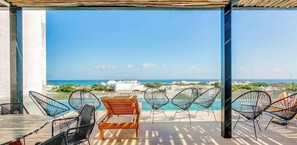 Outdoor dining - Oceanview Pool | Gym | 5th Ave Around the Corner (Playa del Carmen)