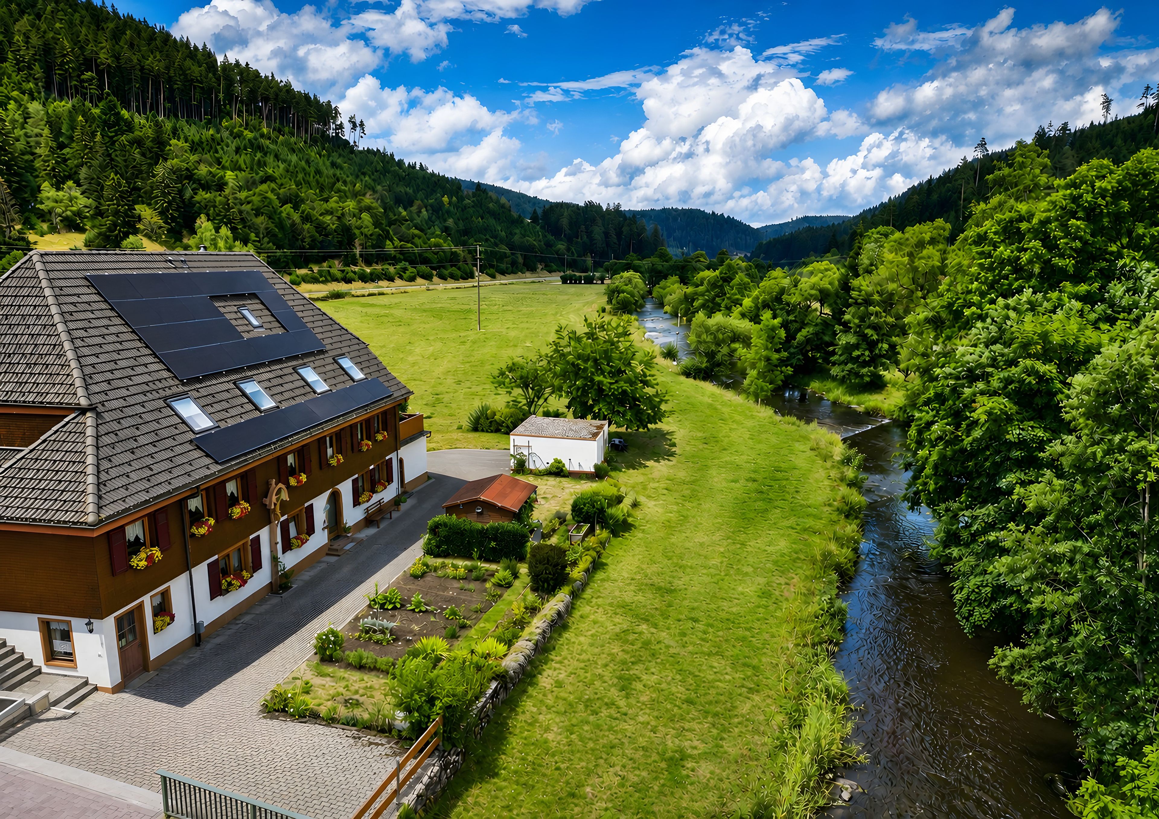 A building with a sloped roof, a paved driveway, and a small garden area.