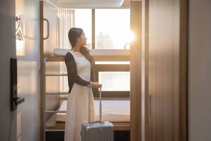 Habitación cuádruple básica, vistas a la ciudad | Wifi gratis