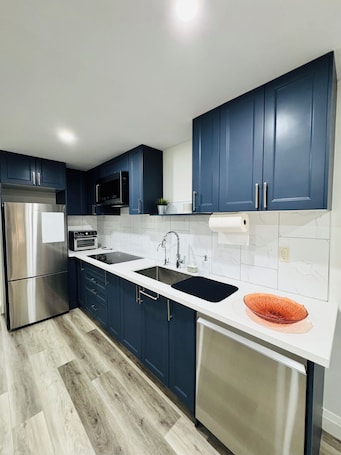 Private kitchen. The Elmira Modern - A Place to Relax and Enjoy