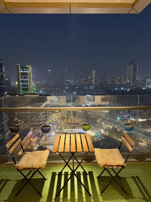 Outdoor dining - City Lights Heaven with Jacuzzi & Cozy Lounge (Gurugram)