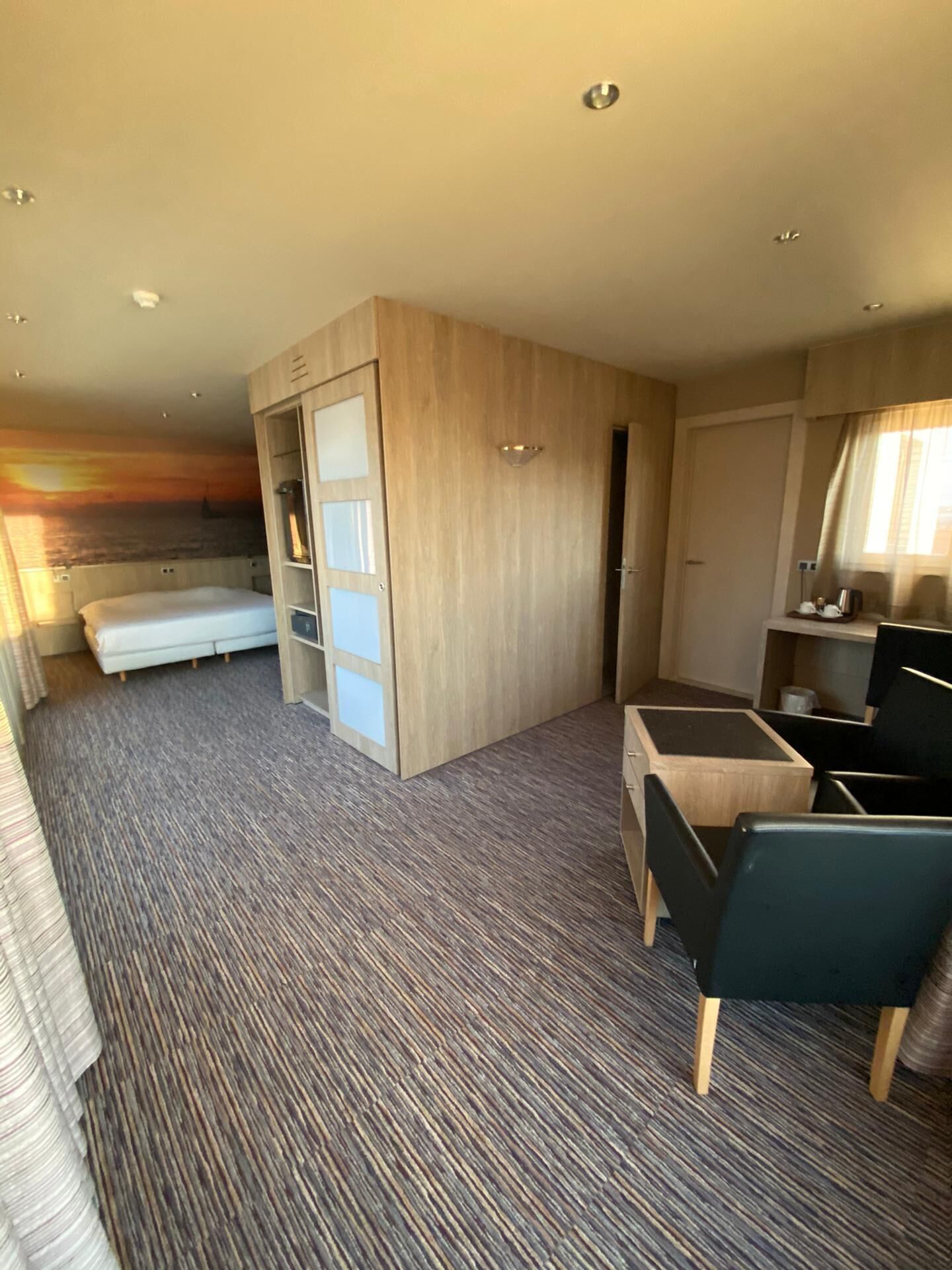 Suite Deluxe, 1 grand lit | Coin séjour | TV connectée, Netflix, films à la carte, services de streaming