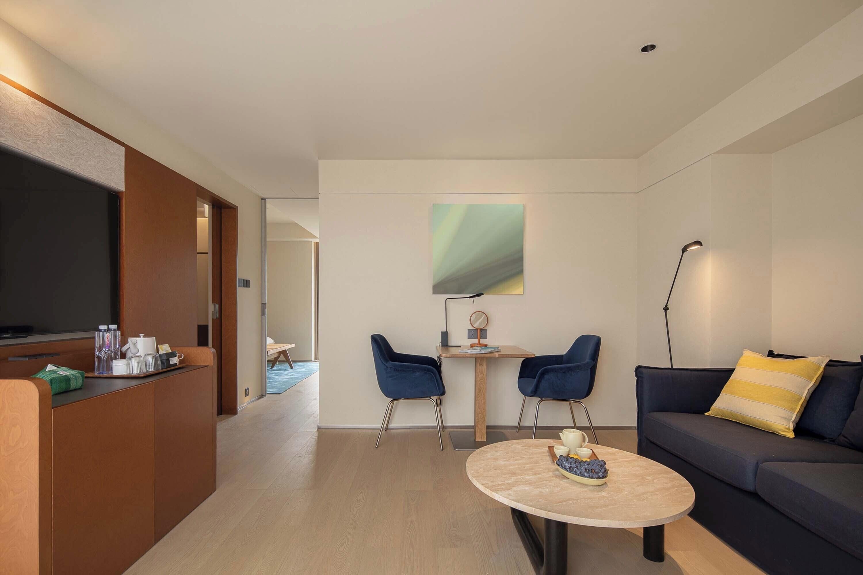 Signature Suite, City View | Minibar, laptop workspace, blackout drapes, free WiFi