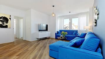 Appartamento Deluxe, vista città (Flavia 28) | Area soggiorno