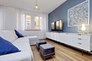 Deluxe appartement, uitzicht op de stad | Woonruimte