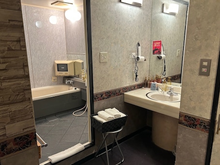 Room | Bathroom | Separate tub and shower, hair dryer, bathrobes, slippers. HOTEL LAGNA