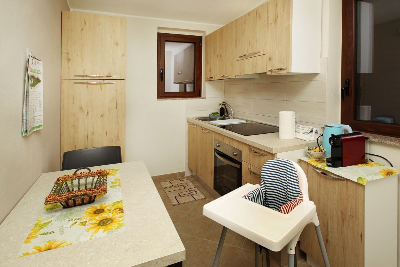 Fridge, oven, stovetop, highchair