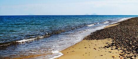 Una spiaggia nelle vicinanze, teli da spiaggia