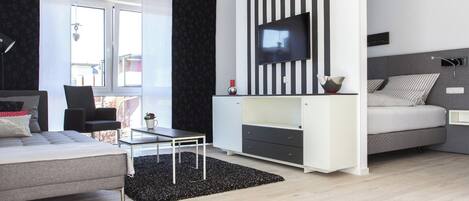 Apartamento, sacada, vista para a cidade | Área de estar