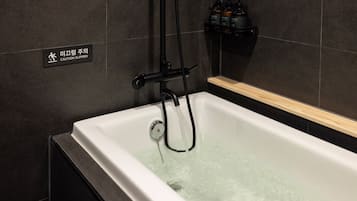 Signature | Bathroom | Shower, rainfall showerhead, hair dryer, towels