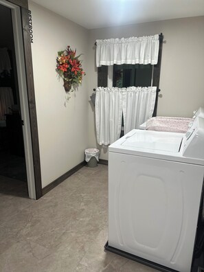 Hair dryer, towels, soap, toilet paper - Loie’s Suite - room at Bramble House of Bloomingdale LLC, Bed & Breakfast  (Shickshinny)