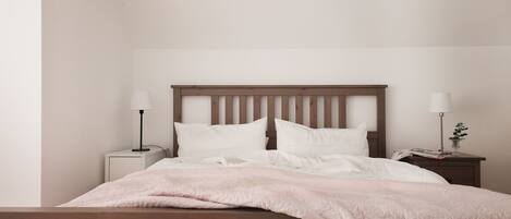 Desk, travel crib, free WiFi, bed sheets