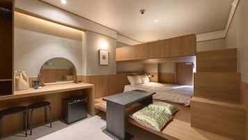 Deluxe Quadruple Room, City View | Laptop workspace, blackout curtains, soundproofing, free WiFi