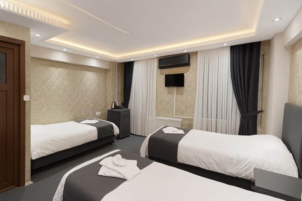 Habitación triple Deluxe | Wifi gratis