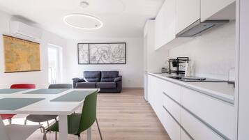Deluxe Apartment, 3 Bedrooms, Private Bathroom, Poolside | Private kitchen | Highchair