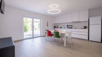 Family Condo, 2 Bedrooms, Kitchen, Pool View | Private kitchen | High chair