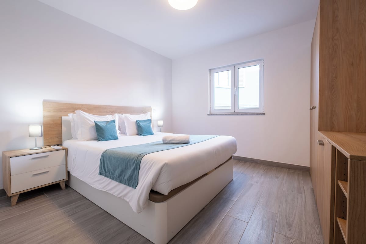 Deluxe Apartment, 1 Queen Bed with Sofa bed, Patio, Courtyard View | Iron/ironing board (on request), WiFi (free)