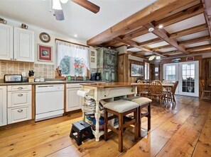 Fridge, microwave, oven, stovetop - Escape to Three  Bears Cottage, a cozy cedar-lined cottage just two blocks from Lake Huron. Enjoy evenings by the fireplace, mornings on the wrap-around porch, and peaceful moments surrounded by nature on the beautiful Bruce Peninsula. (Wiarton)