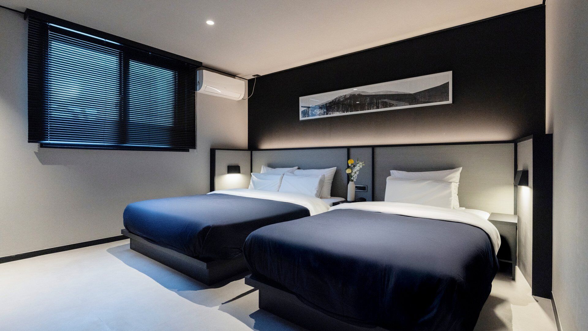 Signature Pool Suite | Premium bedding, individually decorated, blackout drapes, soundproofing