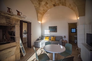 Comfort Apartment, Courtyard View | Living area | TV