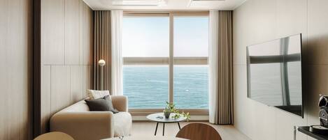 Family Two Room Ocean | Living area | 55-inch Smart TV with cable channels