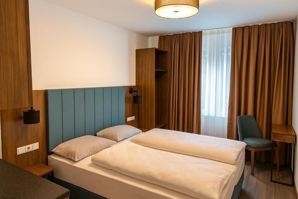 Chambre Double Deluxe | Rideaux occultants, chambres insonorisées