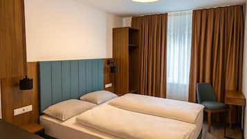 Habitación Deluxe doble | Cortinas opacas y sistema de insonorización