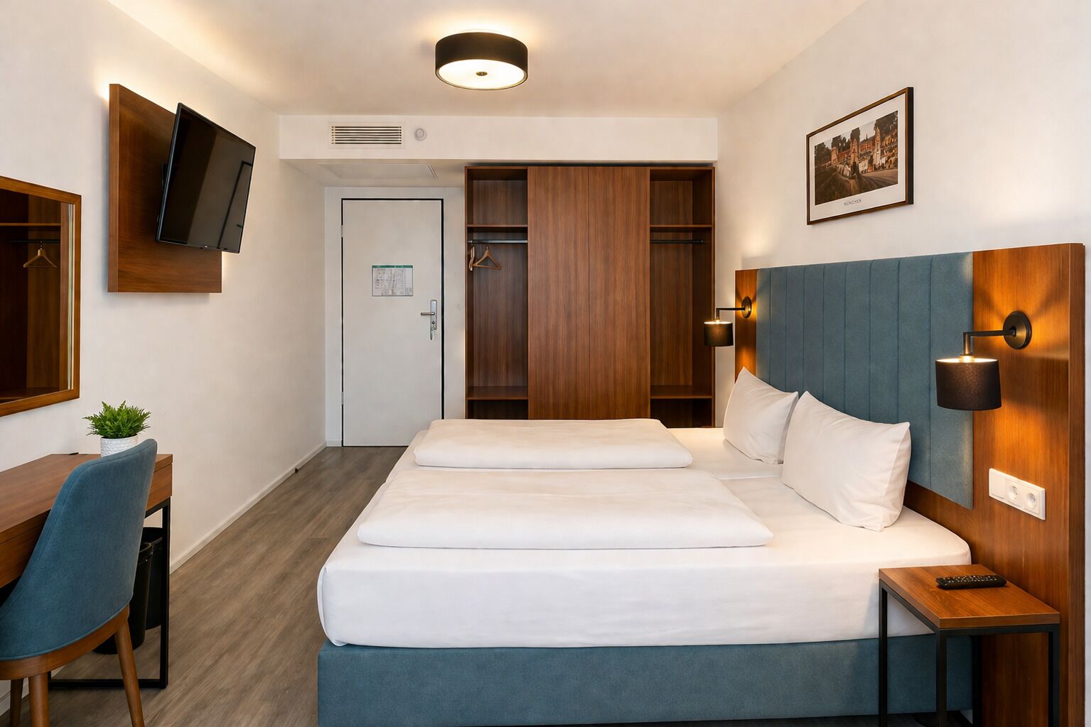 Deluxe Triple Room, Non Smoking | Blackout drapes, soundproofing