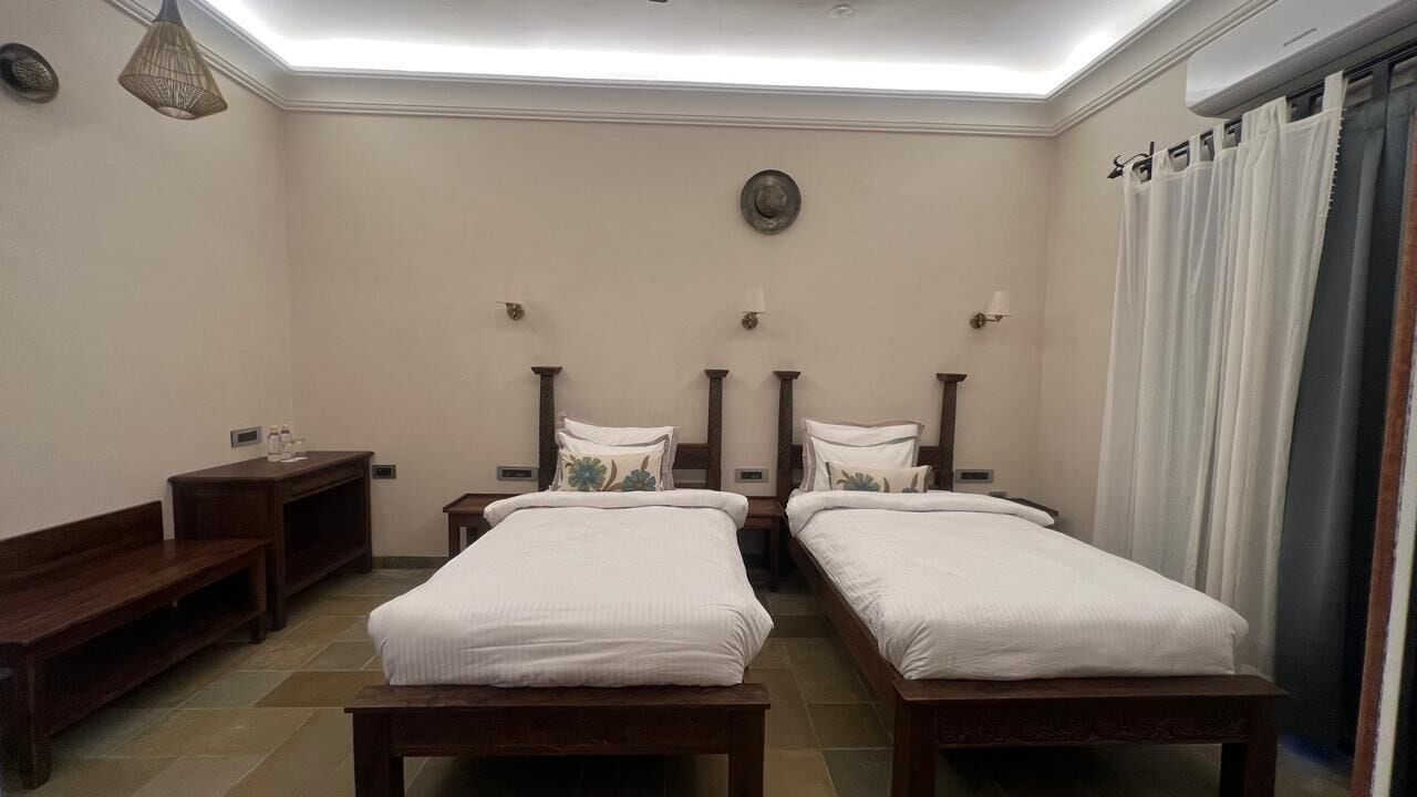 Deluxe Twin kamer, uitzicht op tuin | Woonruimte