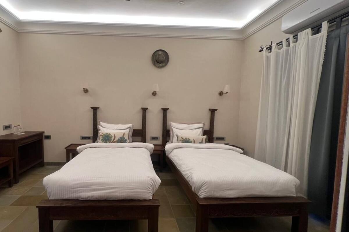 Deluxe Twin Room, Garden View | Living area
