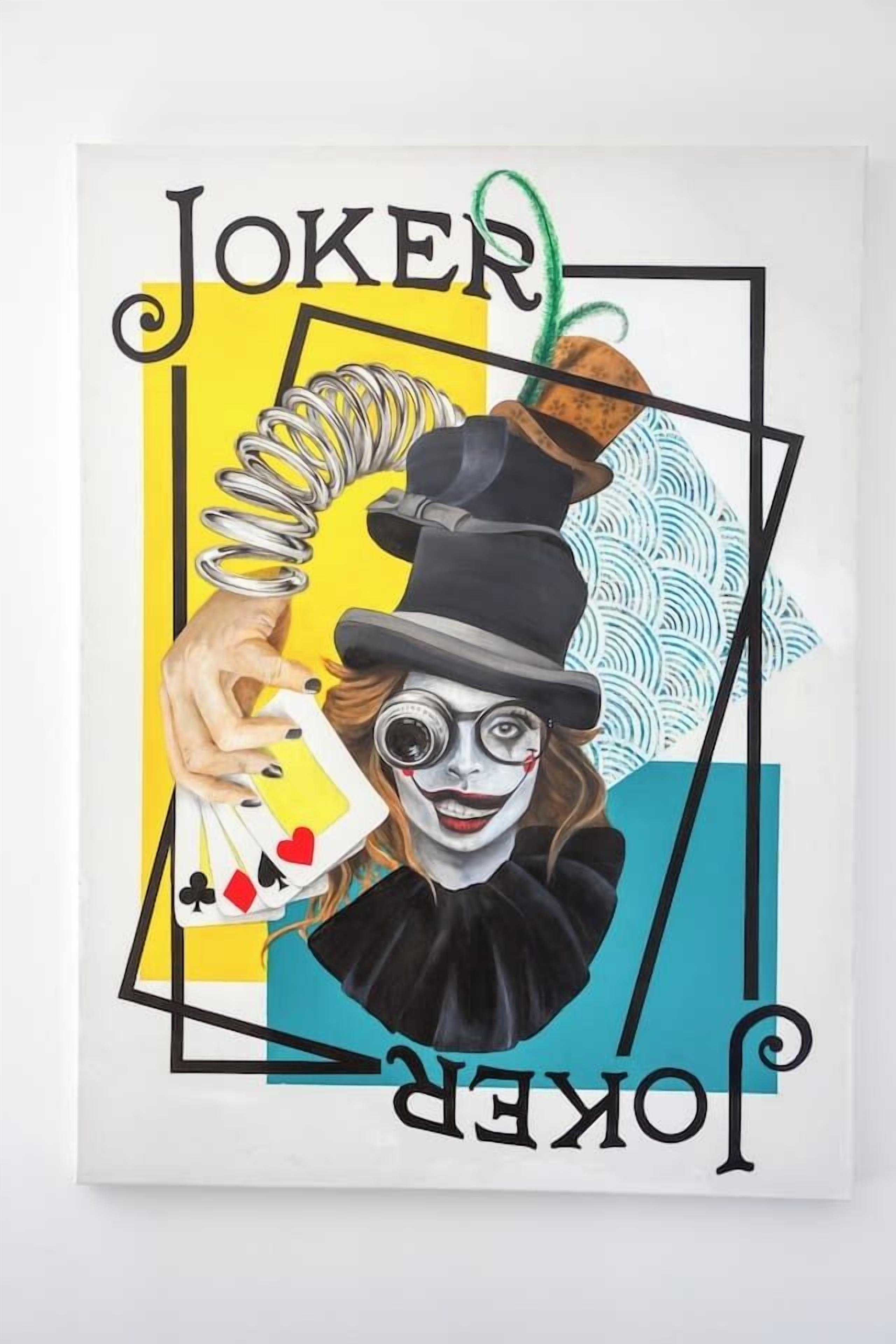 A poster with the word "JOKER" and a hand holding playing cards.