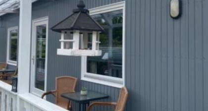 Feel-good double room with outdoor area - Only 300 m from the beach