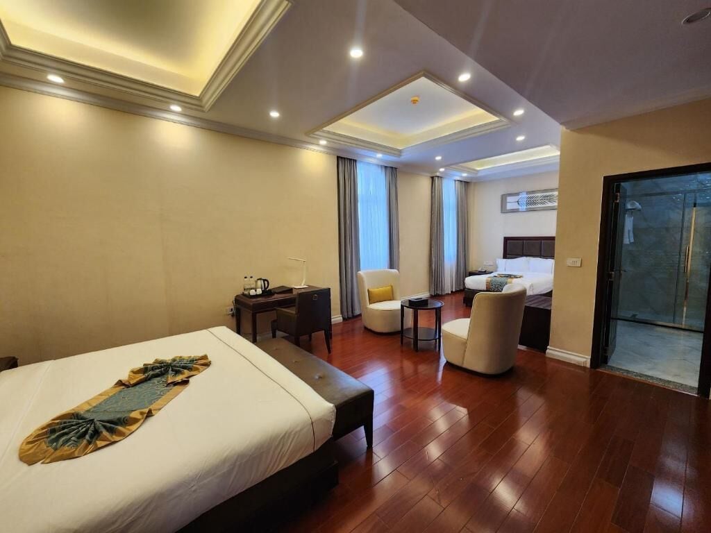 Family Room, Balcony, City View | In-room safe, desk, laptop workspace, iron/ironing board