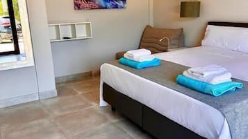 Habitación Confort con 1 cama matrimonial o 2 individuales, balcón, vista a la alberca | Wifi gratis y acceso para silla de ruedas