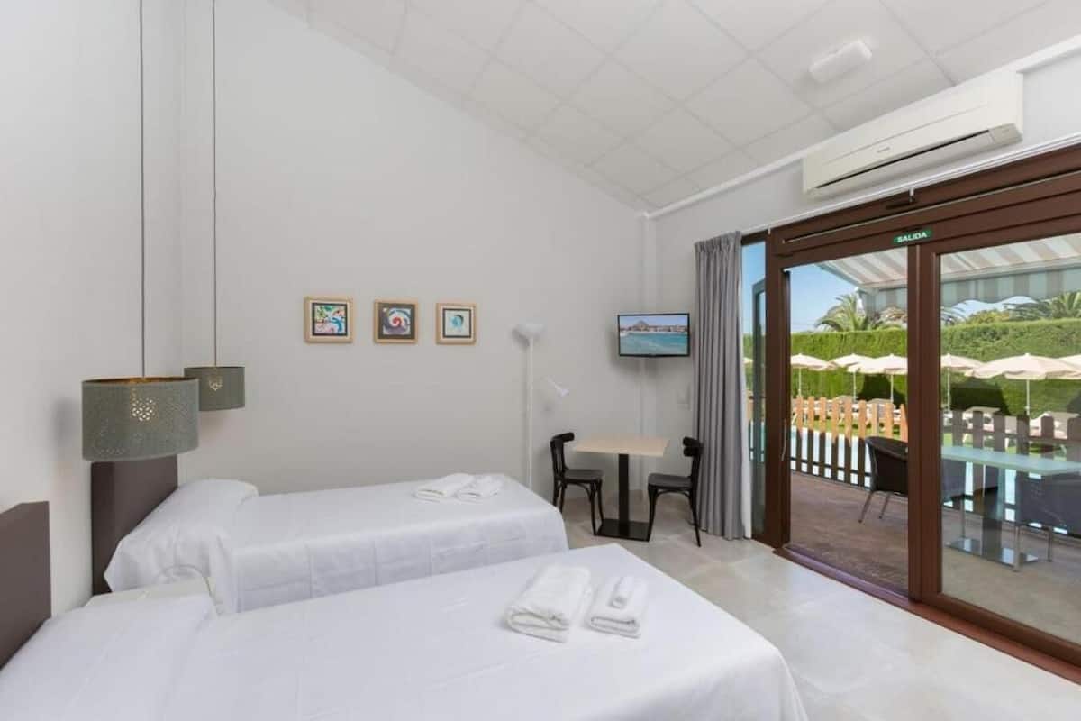 Comfort Double or Twin Room, Balcony, Pool View | Minibar, in-room safe, laptop workspace, blackout drapes