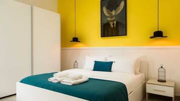 1 bedroom, desk, iron/ironing board, travel crib