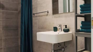 Shower, free toiletries, hair dryer, towels