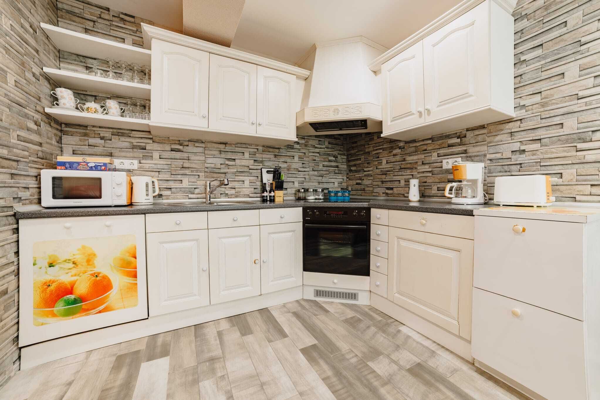 Superior Apartment, Patio, Ground Floor | Private kitchen | High chair