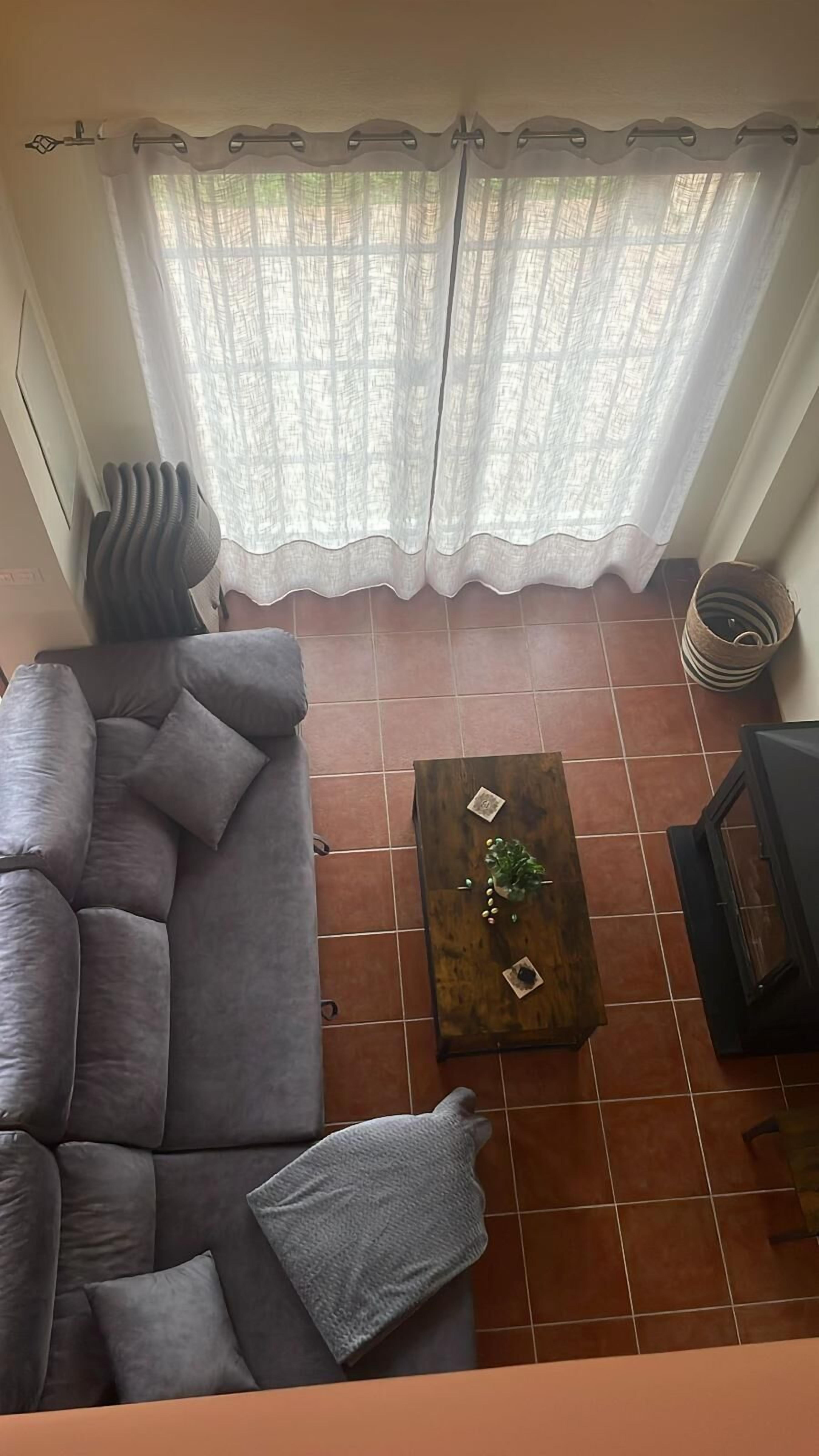 Habitación estándar con 1 cama doble o 2 individuales, vistas al jardín | Zona de estar