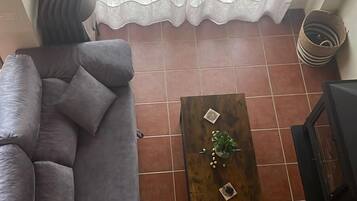 Standardværelse med dobbeltseng eller 2 enkeltsenge - udsigt til have | Opholdsområde