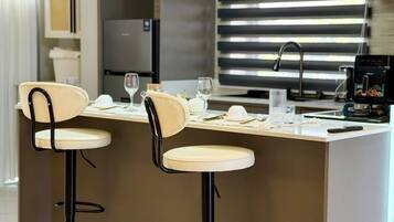 Deluxe Apartment, Balcony, City View | Private kitchen | Microwave, electric kettle