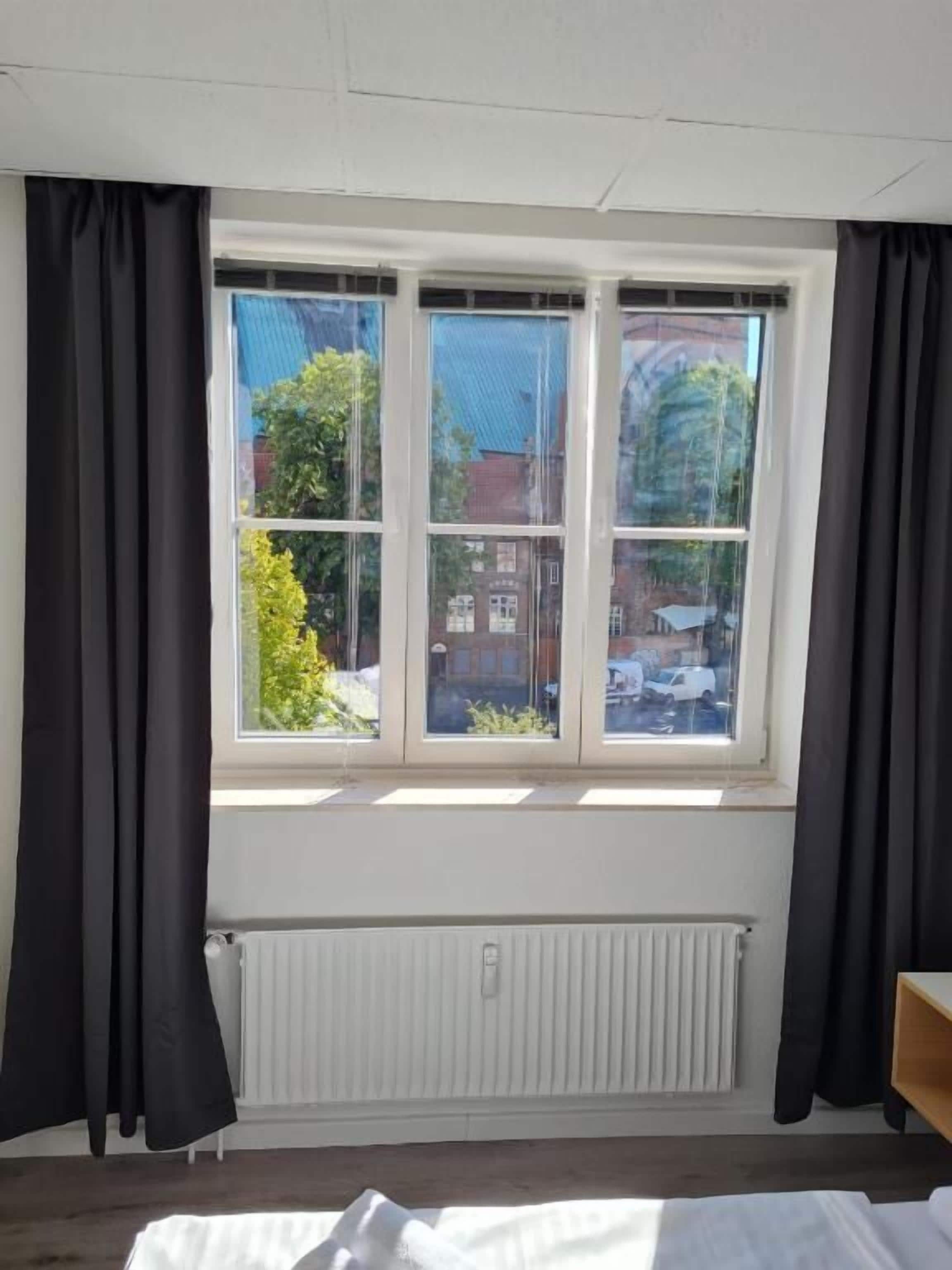 Familienzimmer, Stadtblick | Zimmersafe, kostenloses WLAN