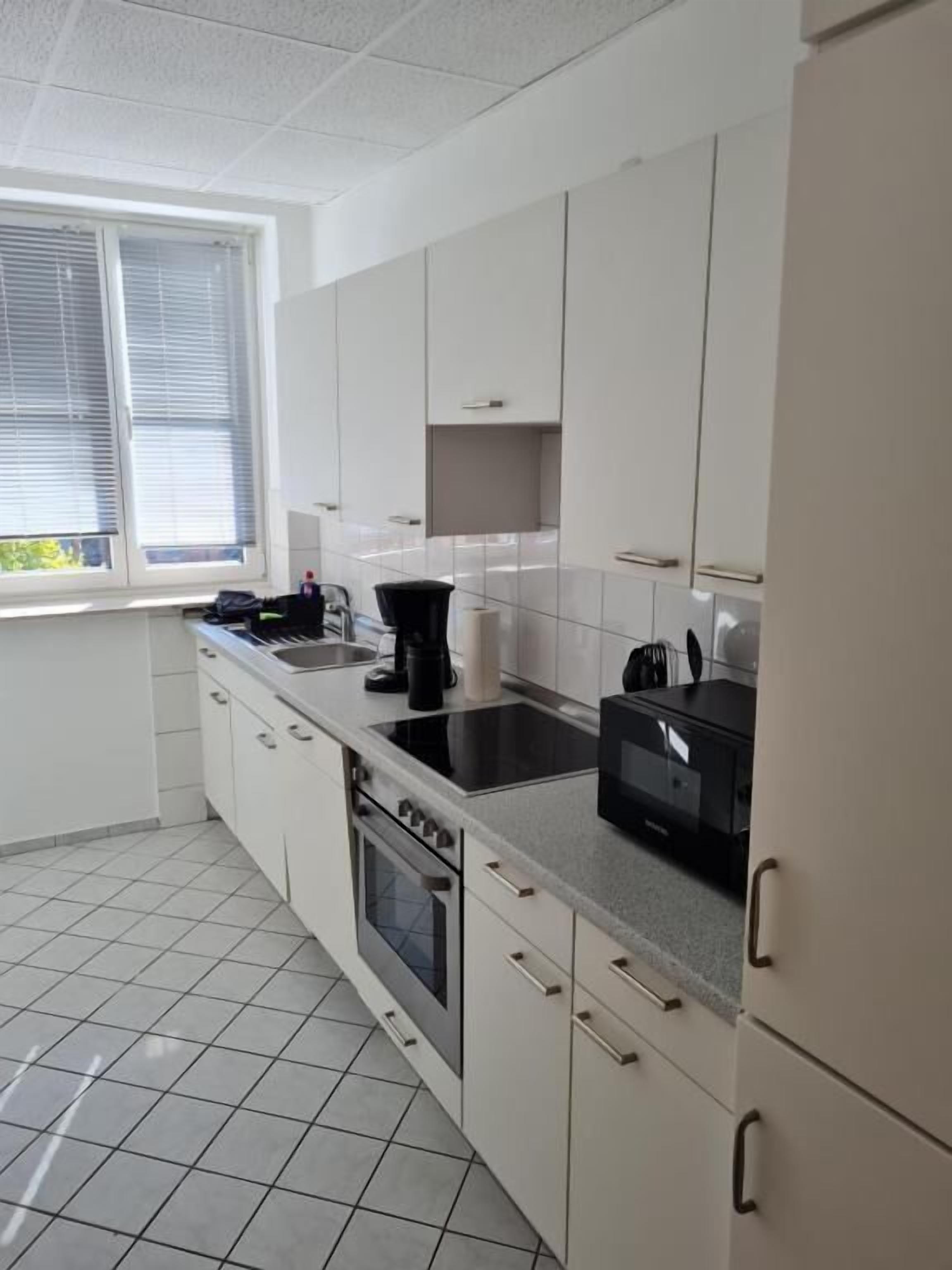 Familienzimmer, Stadtblick | Zimmersafe, kostenloses WLAN