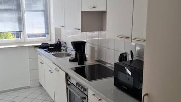 Familienzimmer, Stadtblick | Zimmersafe, kostenloses WLAN