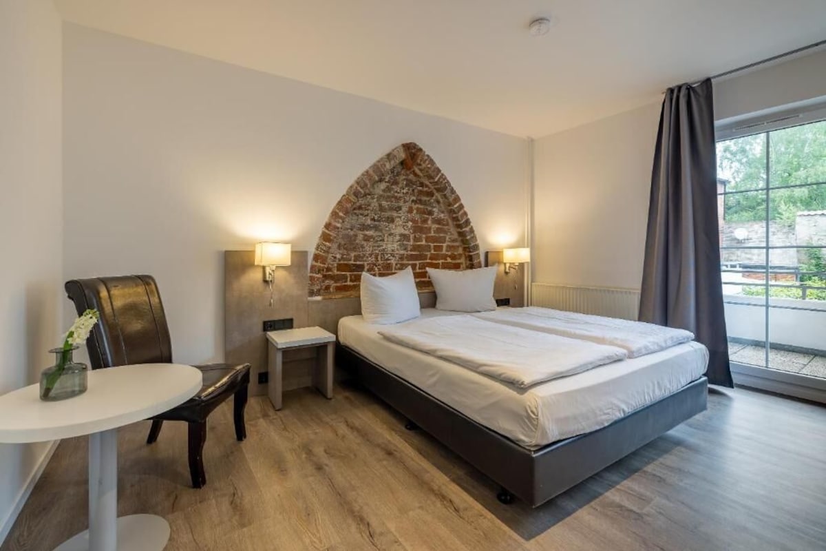 Family Quadruple Room, Balcony, Courtyard View | In-room safe, WiFi (free)