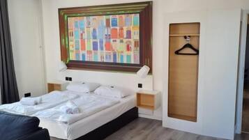 Family Room, City View | In-room safe, free WiFi