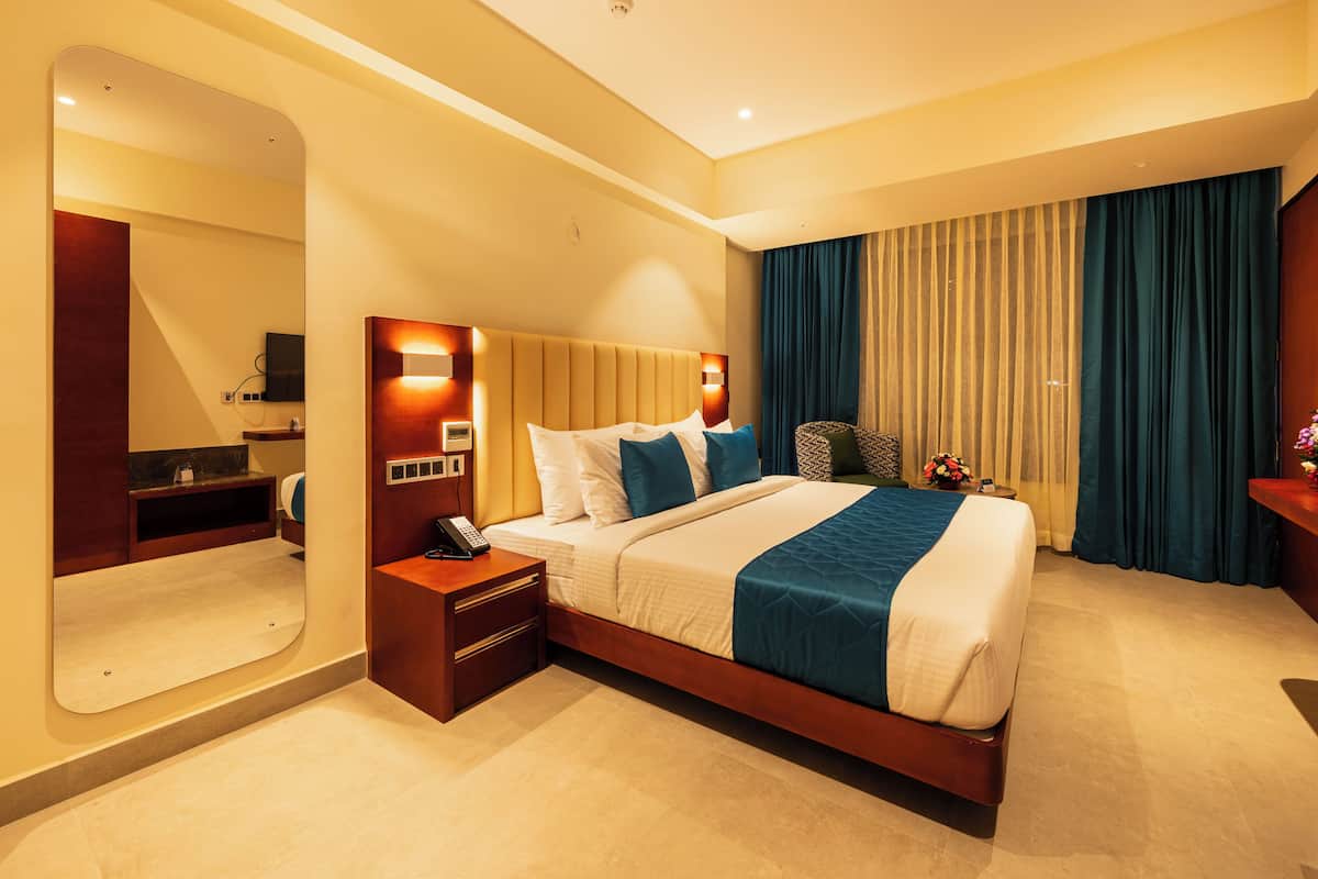 Luxury Double Room, City View | In-room safe, desk, laptop workspace, blackout drapes